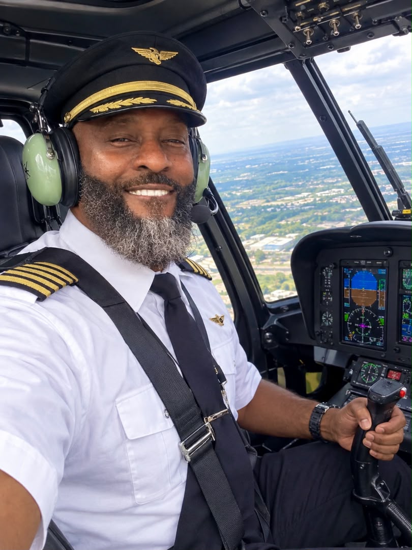 Alex Wood in a helicopter cockpit